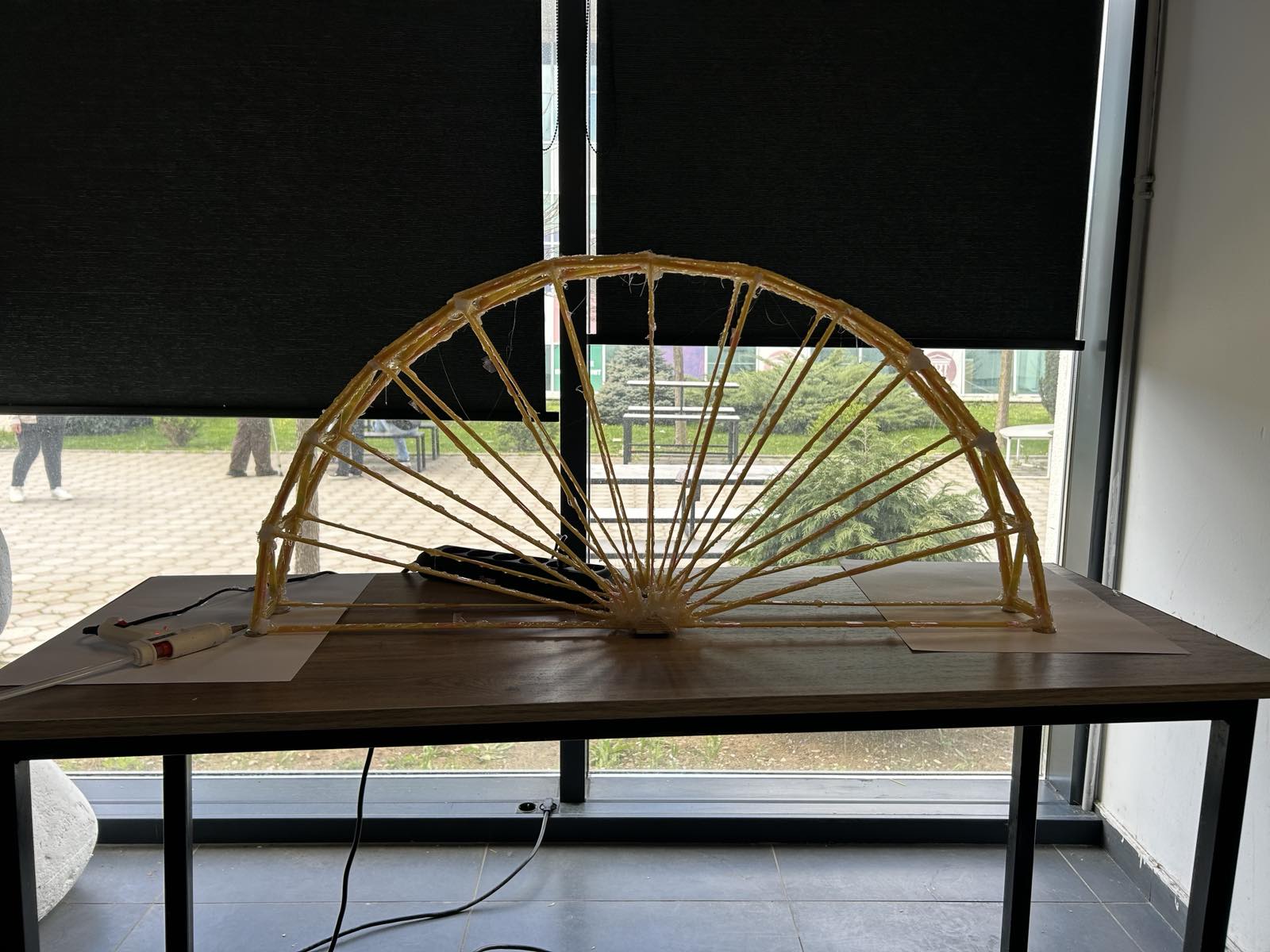Winning semicircular spaghetti tied-arch bridge